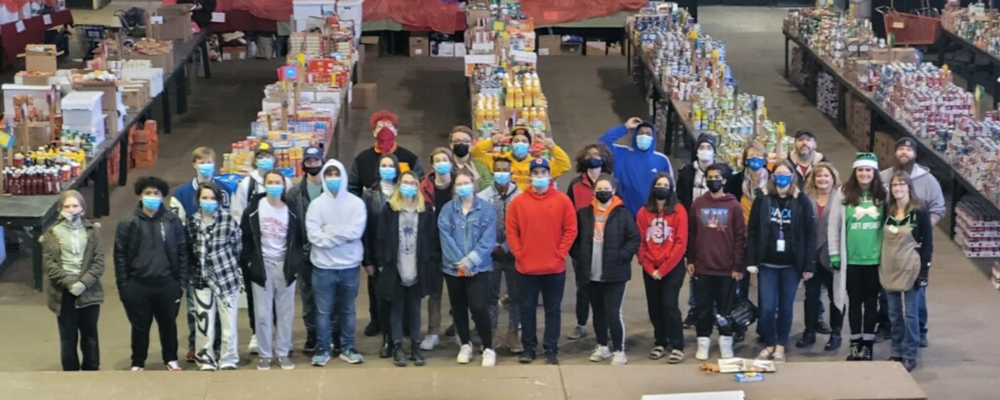 Students donate food and clothing to PIN